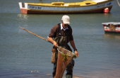 portugal_mitte_obidos_lagoa_kite_fischer-mann_kescher